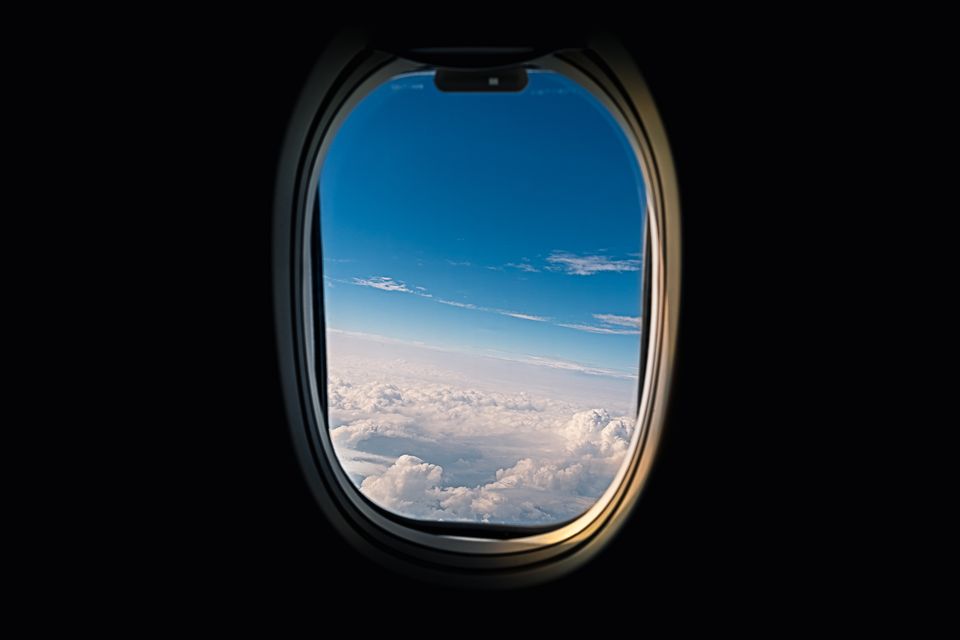 Clouds through an airplane window.
