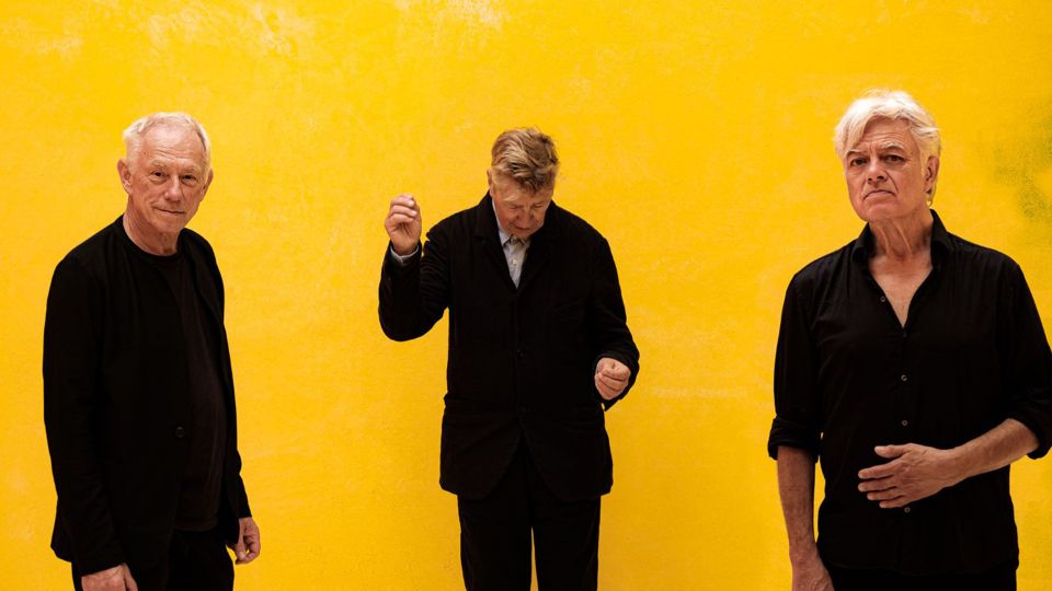 De Nits, muziekband tegen een gele achtergrond