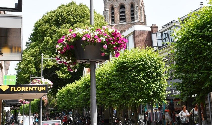 The photo portrays the shopping street of Voorschoten.