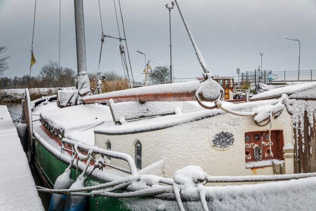 sneeuw op een boot