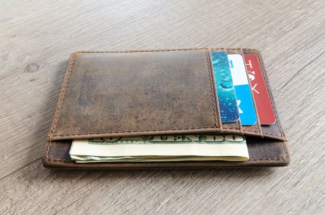 Wallet with cash and cards.